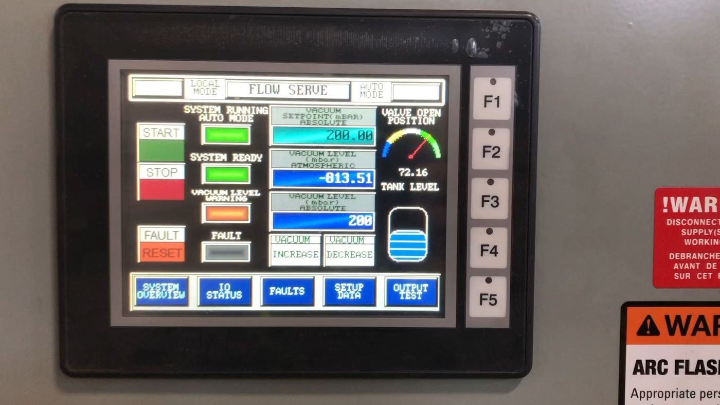 Operator terminal running a PH-programmed vacuum and valve control screen