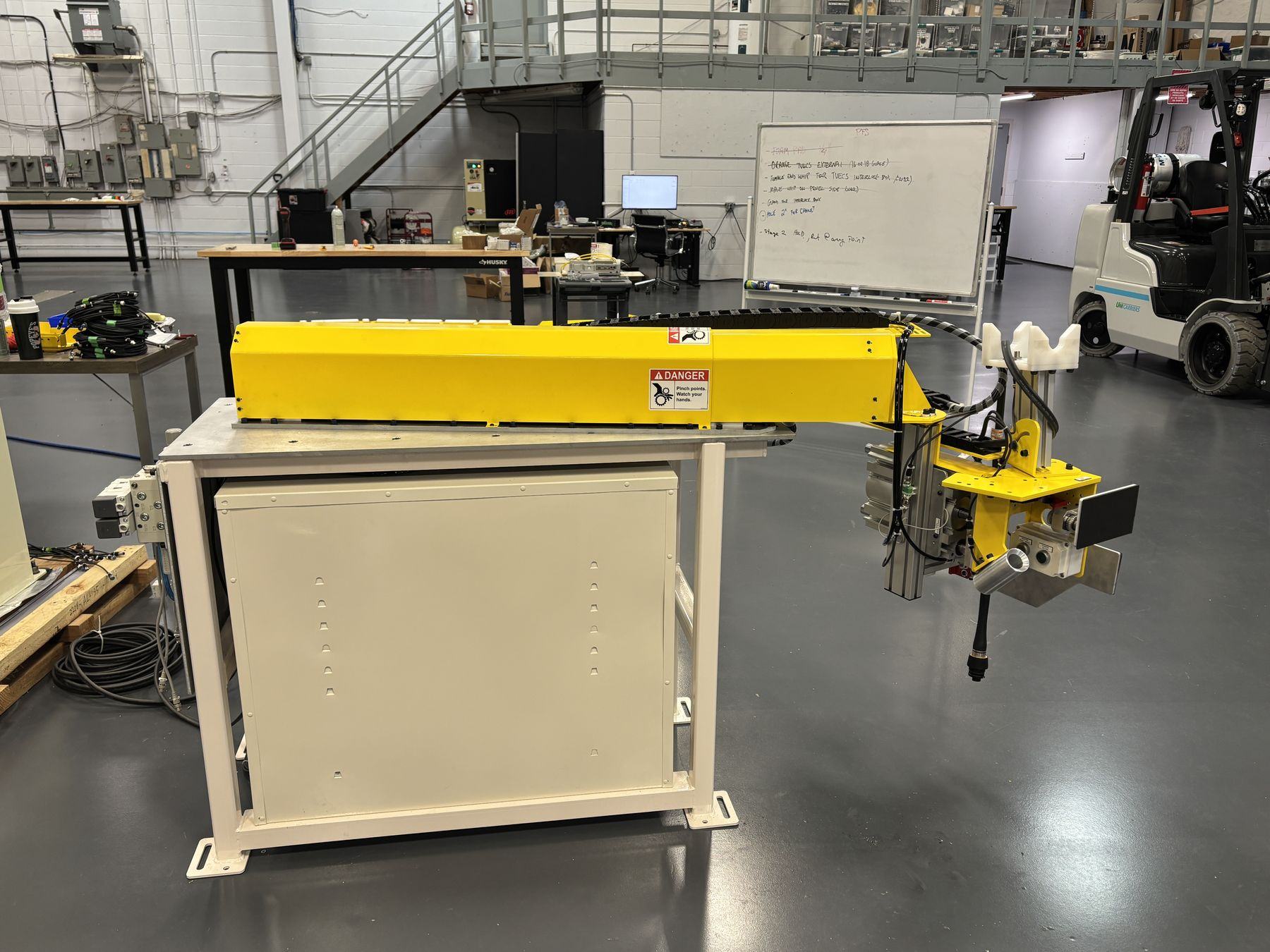 Fabricated articulating tool-balancer arm and powder-coated cabinet built in the PH shop